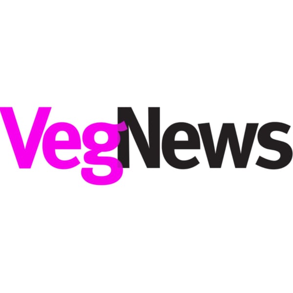 The VegNews logo features "Veg" in bright pink and "News" in black against a white background.
